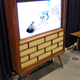 Illustration for article titled M21 Flat Panel has Mid-Century Roots with 21st Century Tech